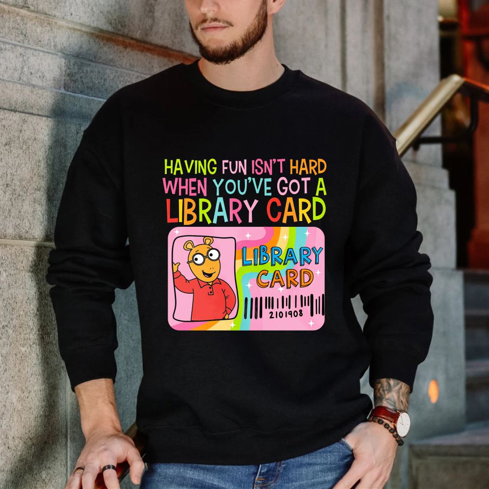 Wardrobecart Having Fun Isn't Hard When You've Got A Library Card With Cartoon Character And Rainbow Design Unisex Classic Sweatshirt