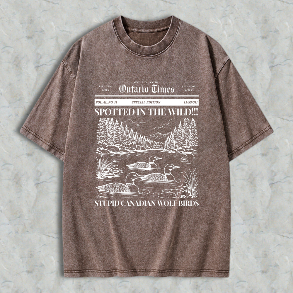 Wardrobecart Duck Scene With Trees And Mountains Spotted In The Wild Stupid Canadian Wolf Birds Ontario Times Newspaper Style Graphic Unisex Washed T-shirt