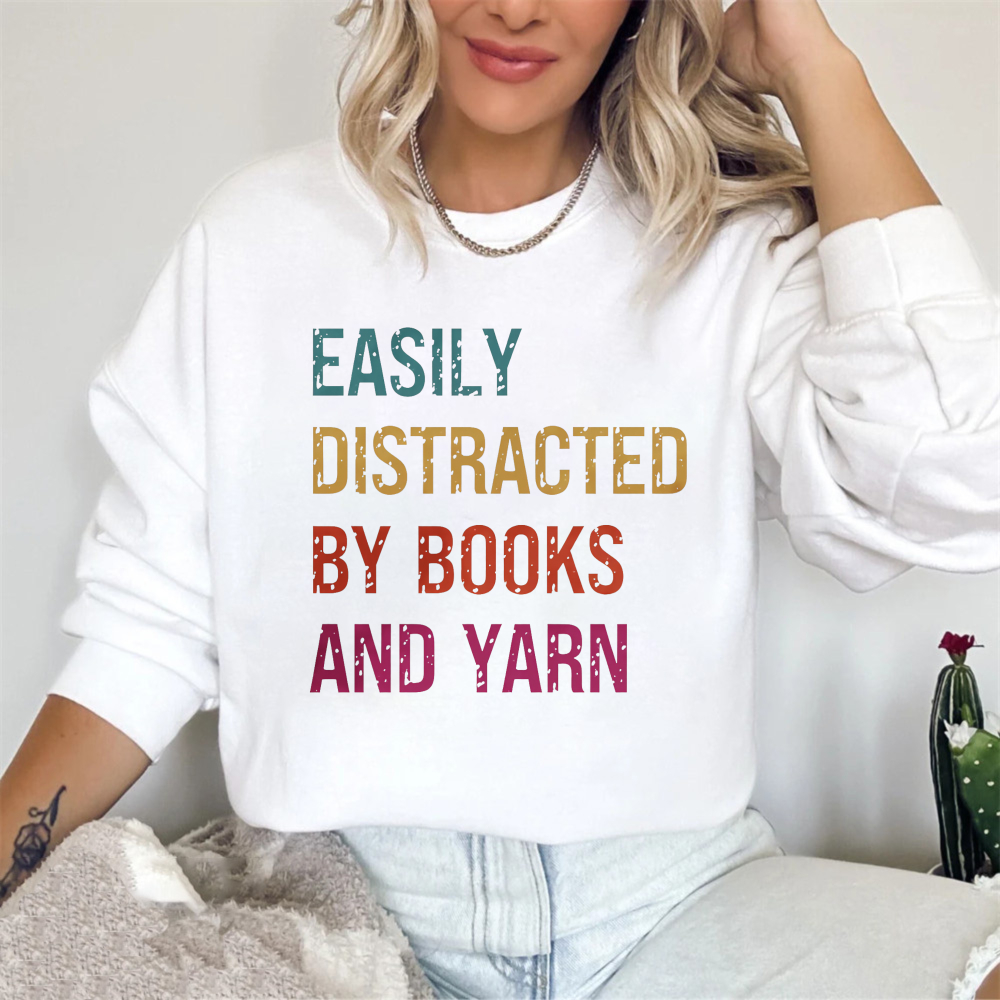 Wardrobecart Easily Distracted By Books And Yarn Unisex Classic Sweatshirt