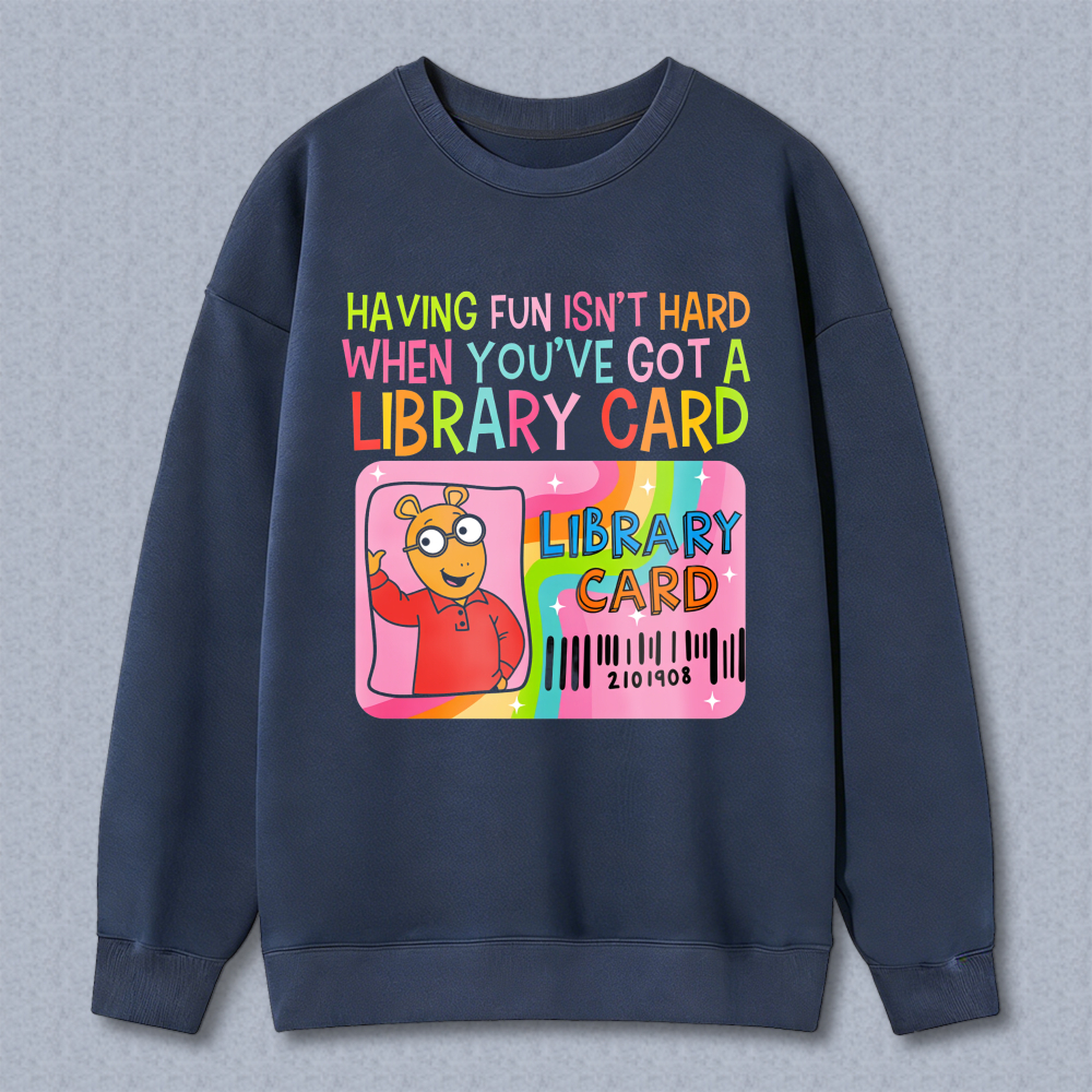 Wardrobecart Having Fun Isn't Hard When You've Got A Library Card With Cartoon Character And Rainbow Design Unisex Classic Sweatshirt