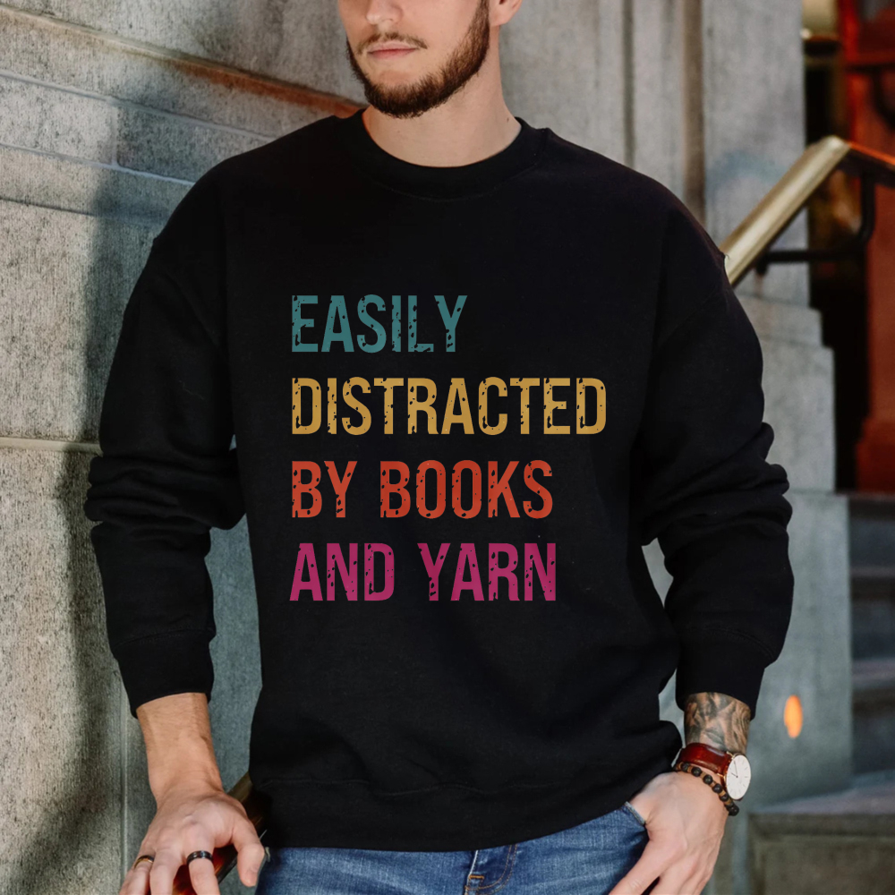 Wardrobecart Easily Distracted By Books And Yarn Unisex Classic Sweatshirt