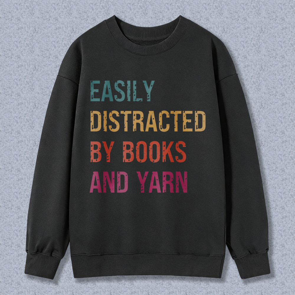 Wardrobecart Easily Distracted By Books And Yarn Unisex Classic Sweatshirt