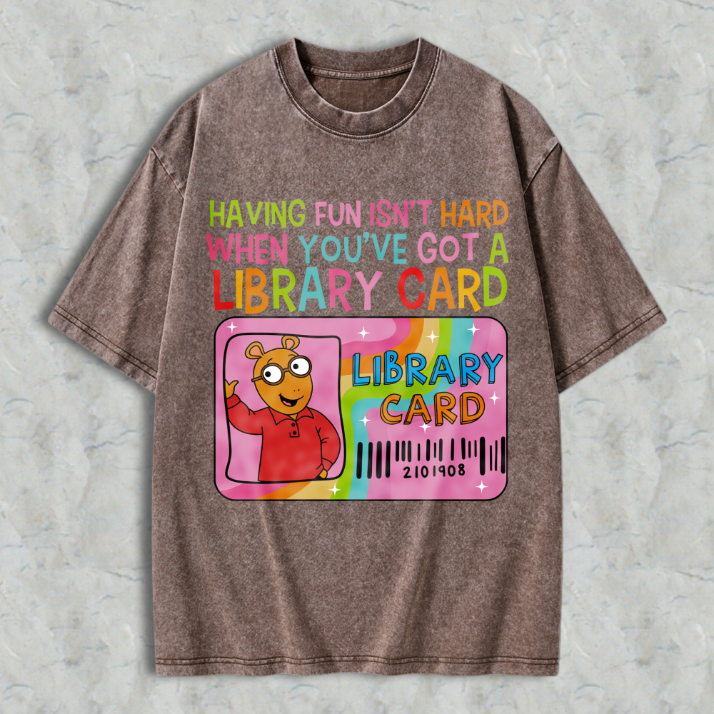Wardrobecart Having Fun Isn't Hard When You've Got A Library Card With Cartoon Character And Rainbow Design Unisex Washed T-shirt
