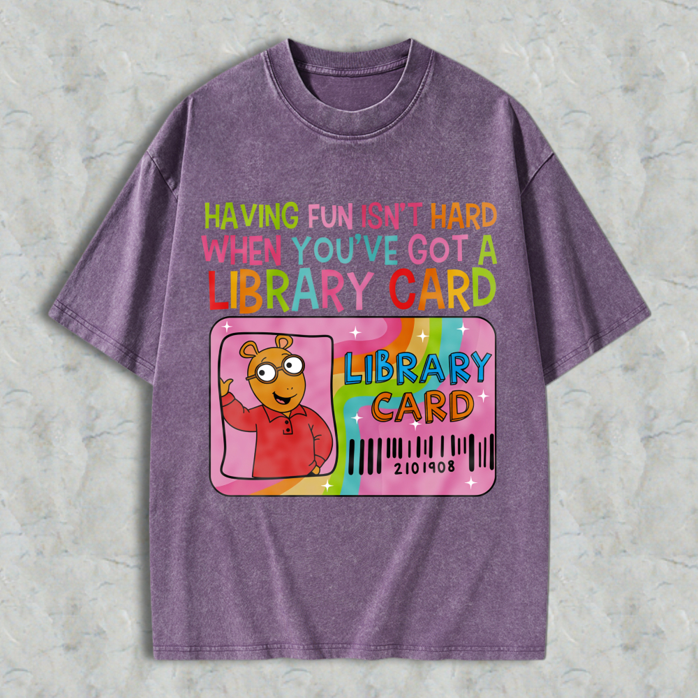 Wardrobecart Having Fun Isn't Hard When You've Got A Library Card With Cartoon Character And Rainbow Design Unisex Washed T-shirt