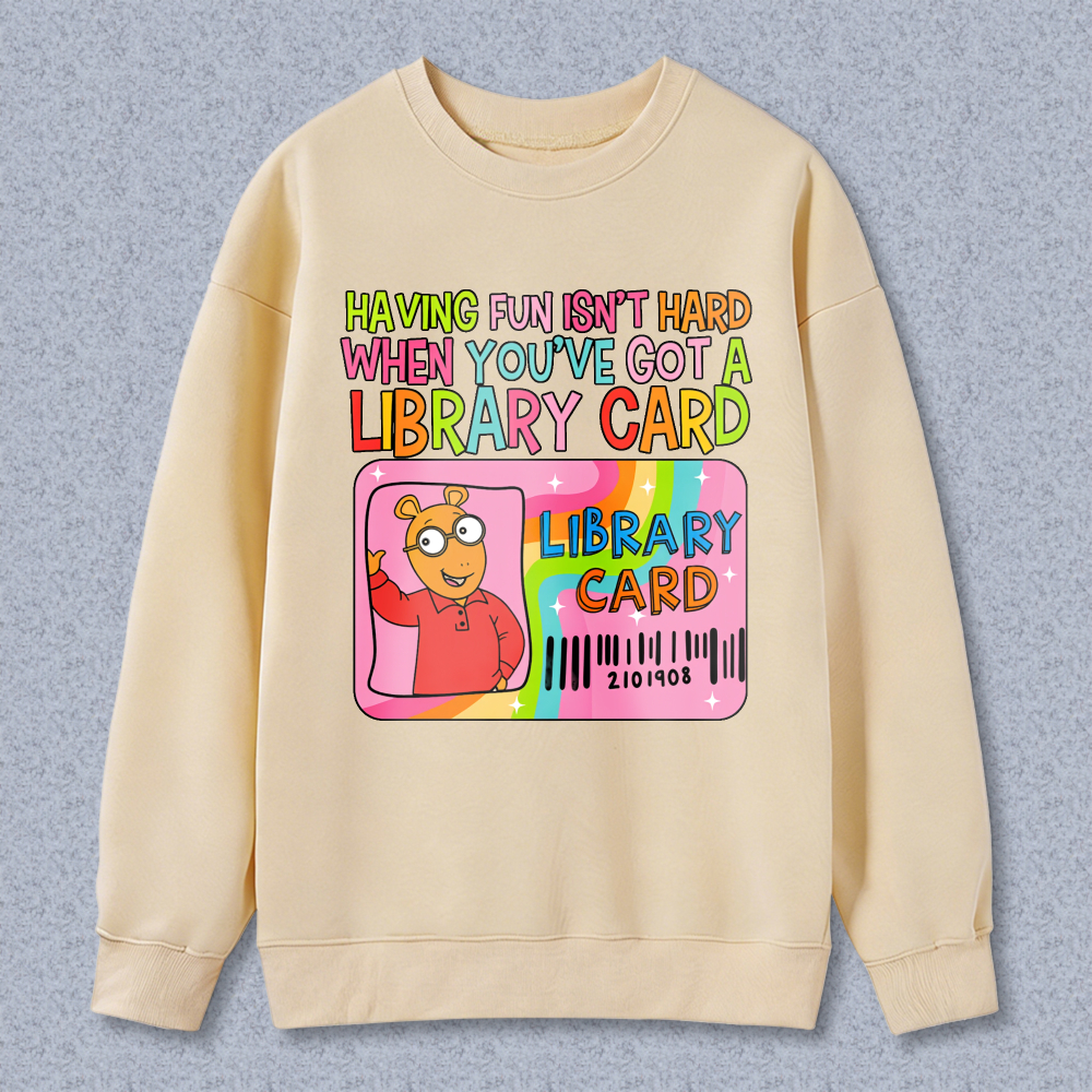 Wardrobecart Having Fun Isn't Hard When You've Got A Library Card With Cartoon Character And Rainbow Design Unisex Classic Sweatshirt