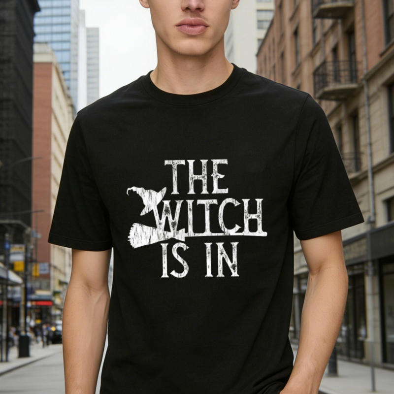 The Witch Is In Halloween Witch Flying On Broomstick Graphic T-shirt
