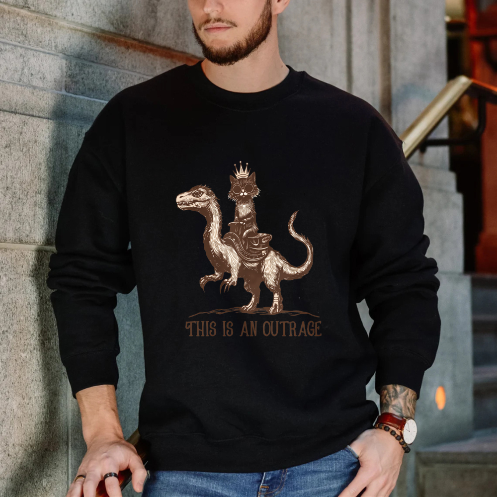 Wardrobecart Cat Riding Dinosaur With Crown And Text This Is An Outrage Unisex Classic Sweatshirt