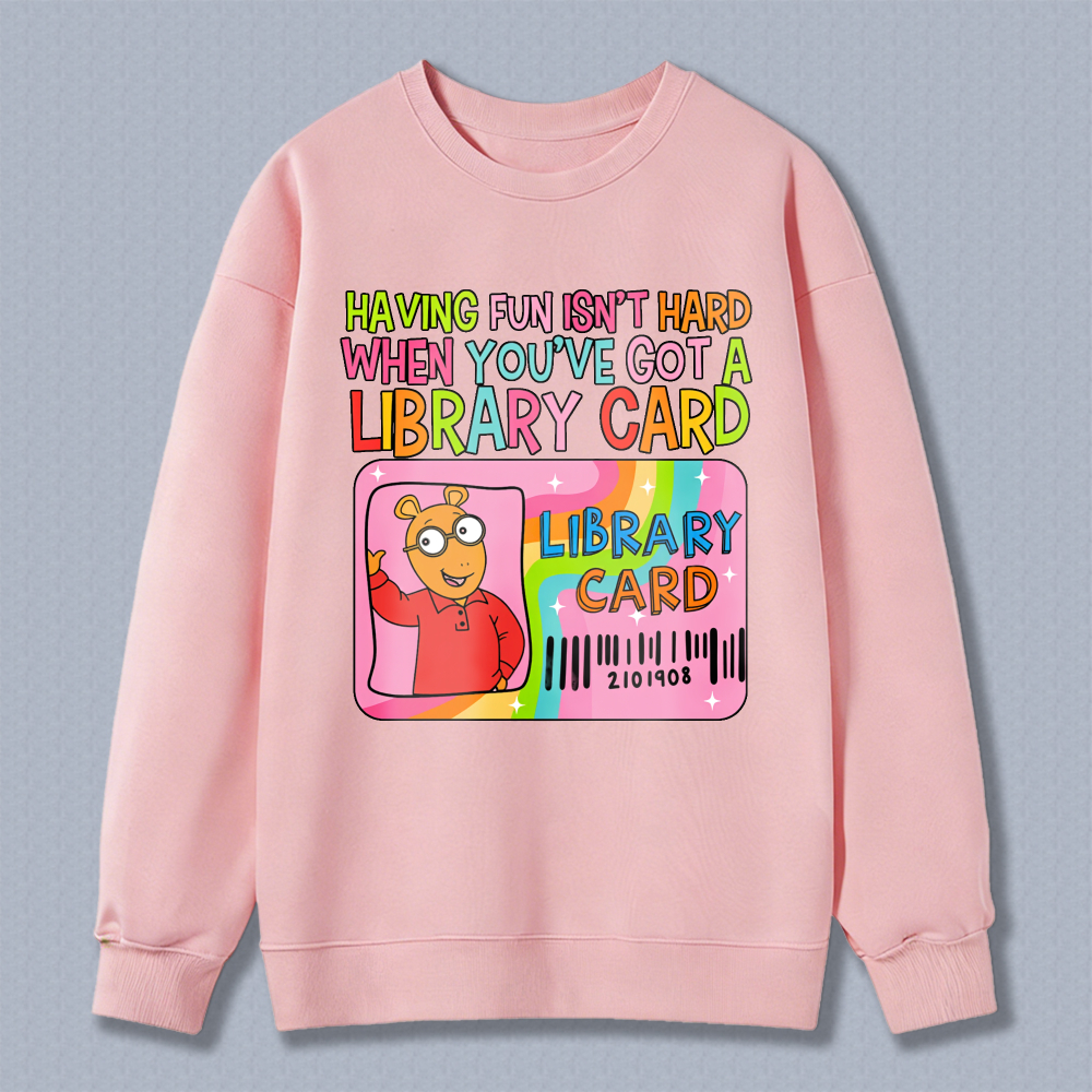 Wardrobecart Having Fun Isn't Hard When You've Got A Library Card With Cartoon Character And Rainbow Design Unisex Classic Sweatshirt