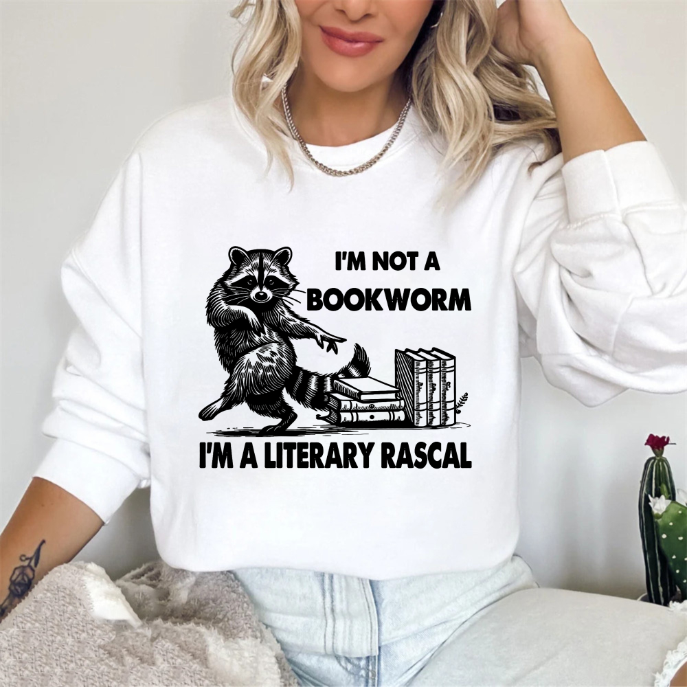 Wardrobecart Raccoon Reading Books I M Not A Bookworm I M A Literary Rascal Unisex Classic Sweatshirt