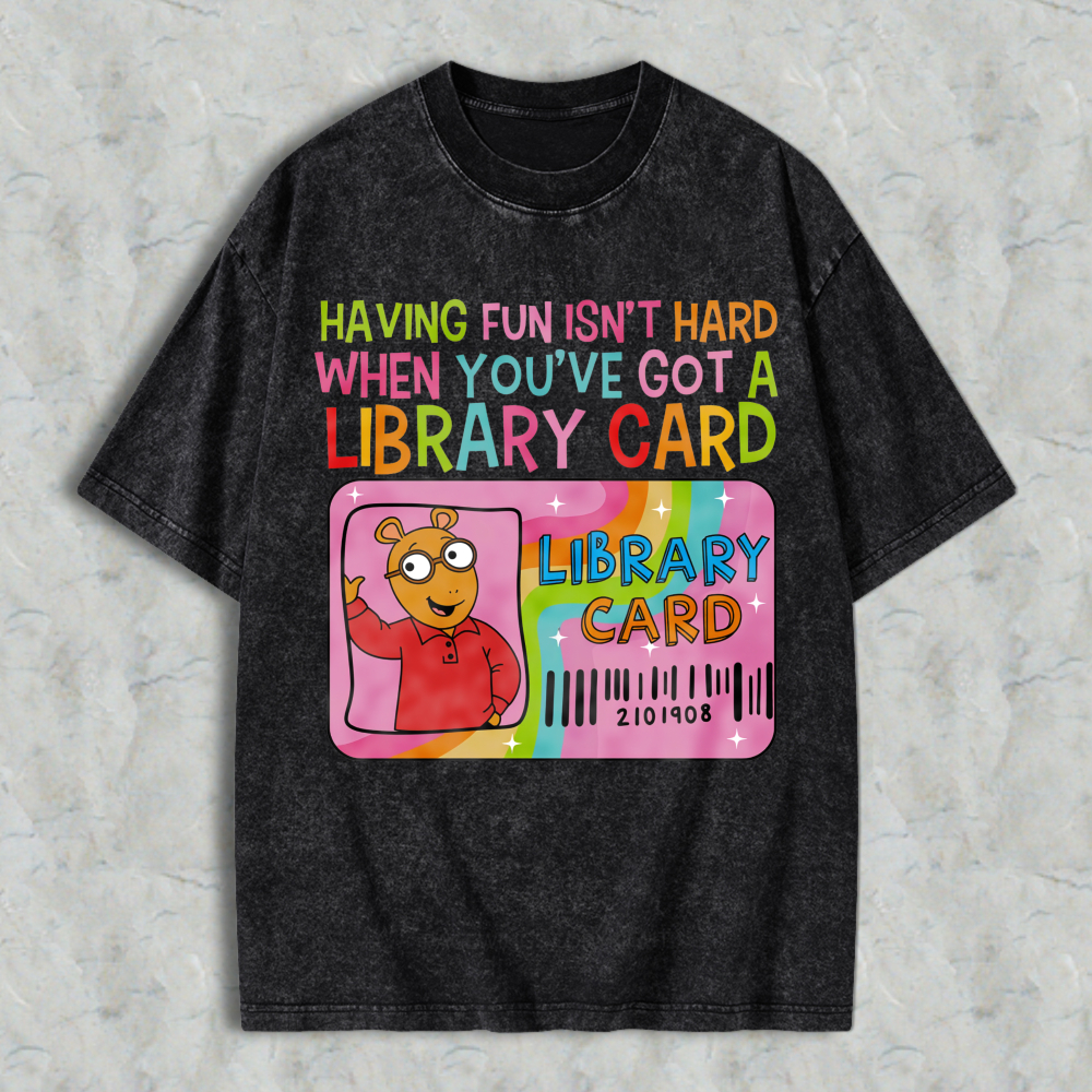 Wardrobecart Having Fun Isn't Hard When You've Got A Library Card With Cartoon Character And Rainbow Design Unisex Washed T-shirt