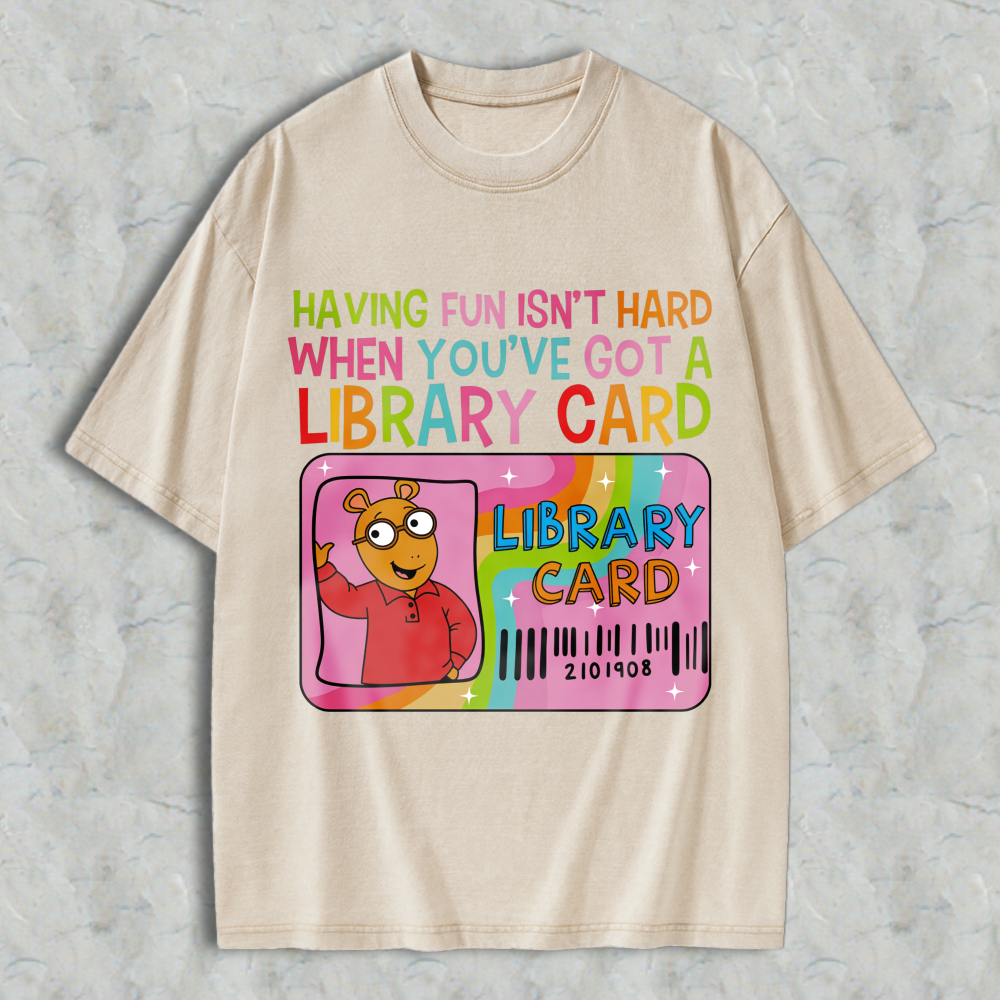 Wardrobecart Having Fun Isn't Hard When You've Got A Library Card With Cartoon Character And Rainbow Design Unisex Washed T-shirt