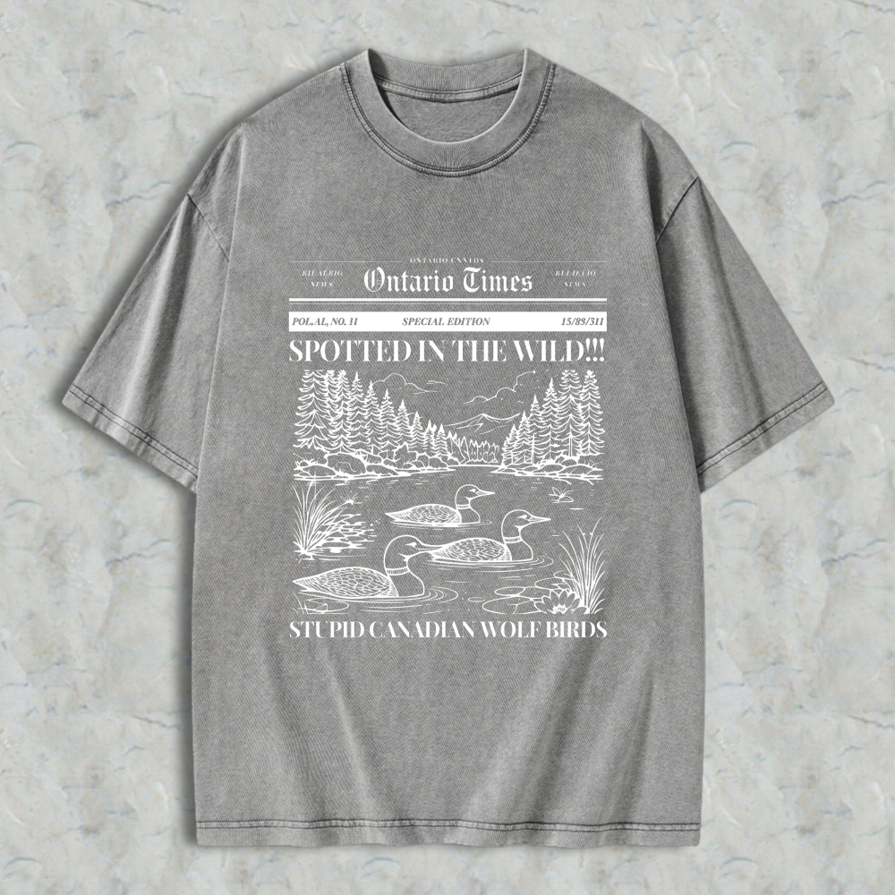 Wardrobecart Duck Scene With Trees And Mountains Spotted In The Wild Stupid Canadian Wolf Birds Ontario Times Newspaper Style Graphic Unisex Washed T-shirt
