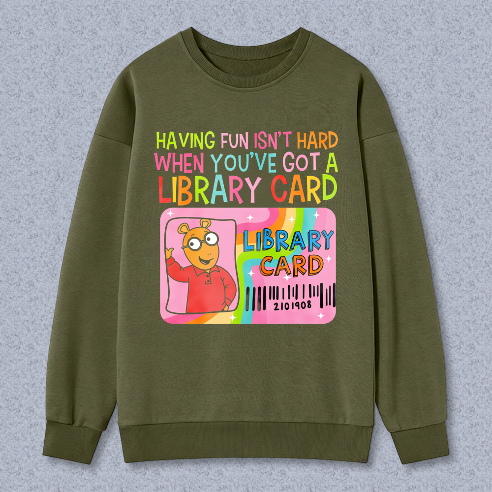 Wardrobecart Having Fun Isn't Hard When You've Got A Library Card With Cartoon Character And Rainbow Design Unisex Classic Sweatshirt