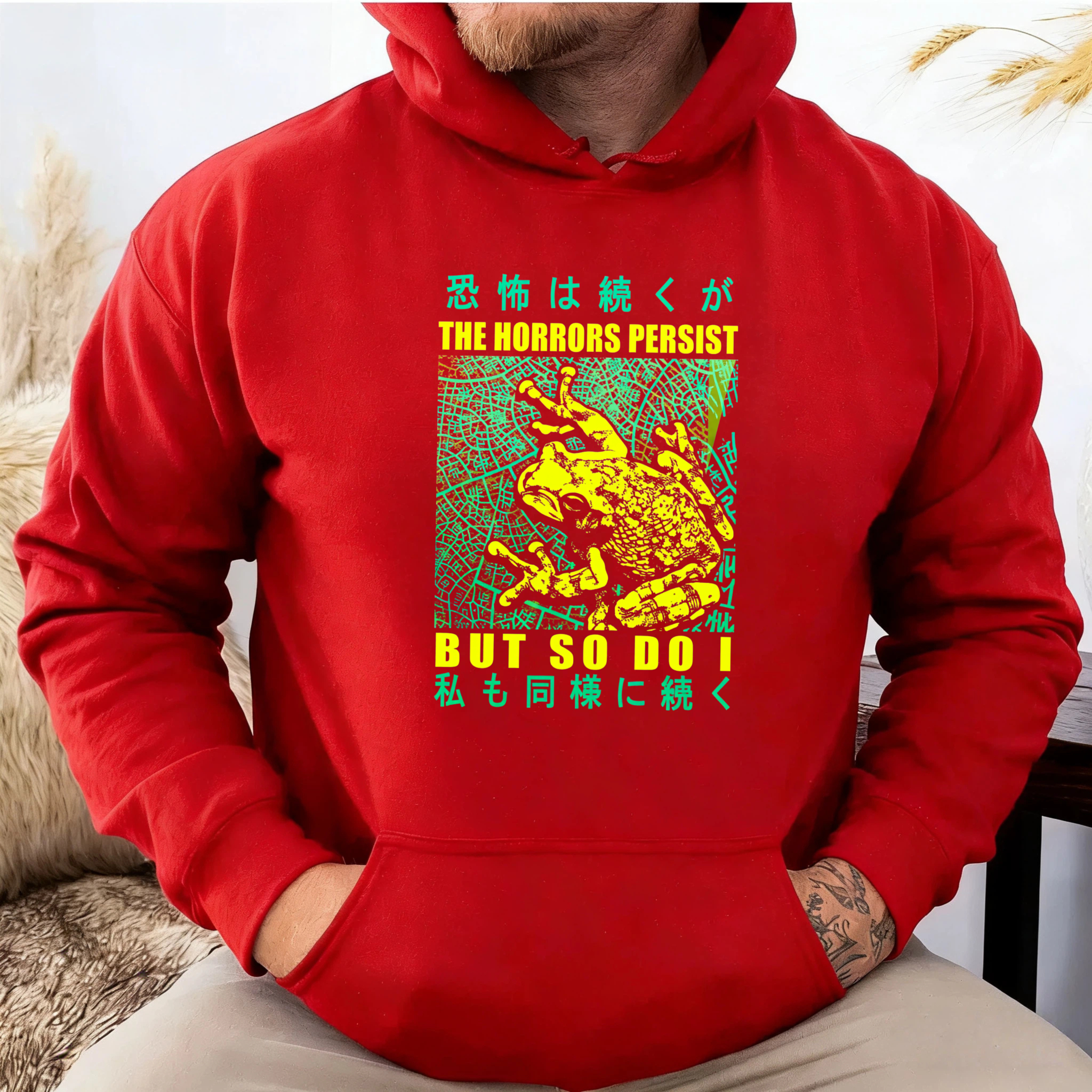 The Horrors Persist But So Do I Frog Hoodie With Japanese Text And Neon Design