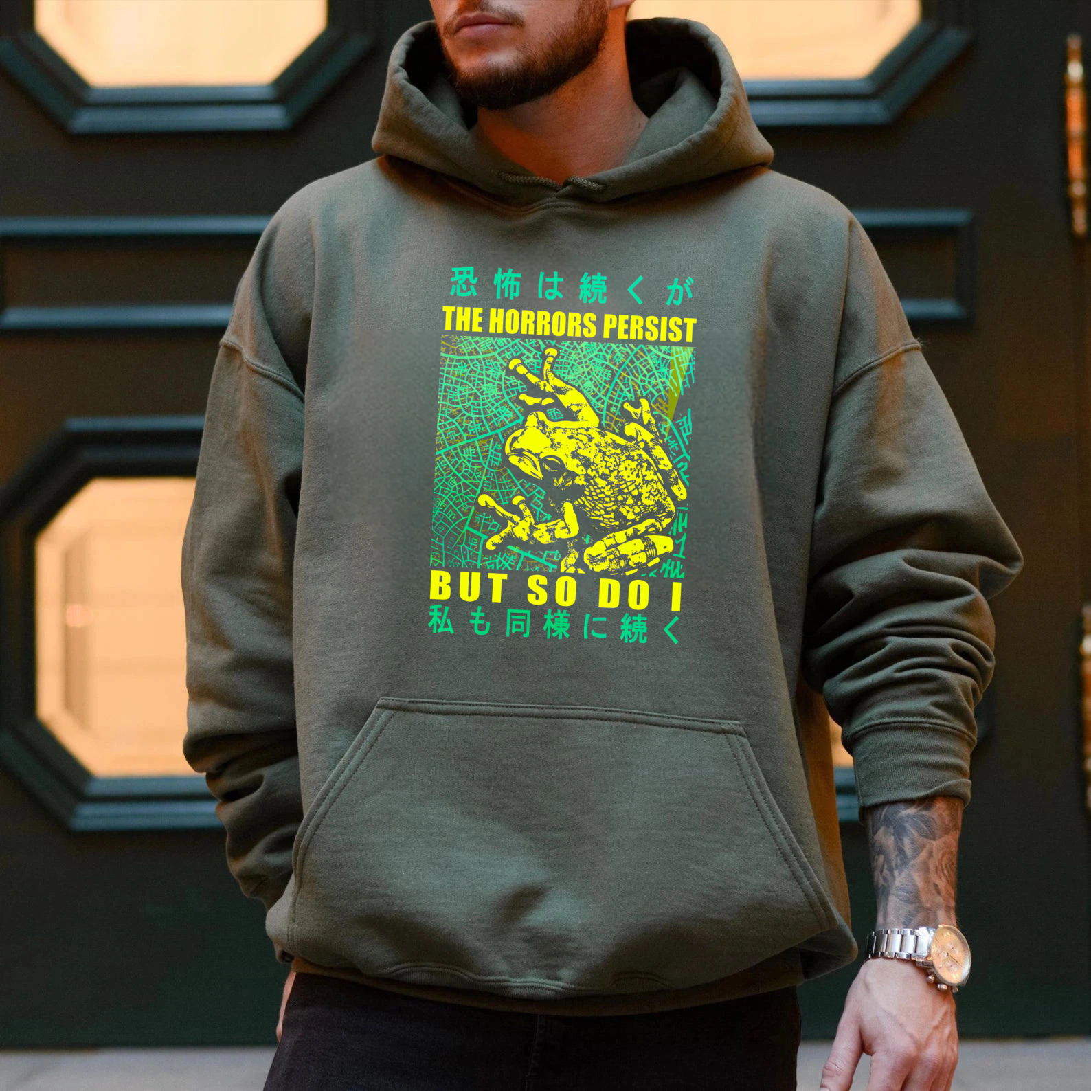 The Horrors Persist But So Do I Frog Hoodie With Japanese Text And Neon Design