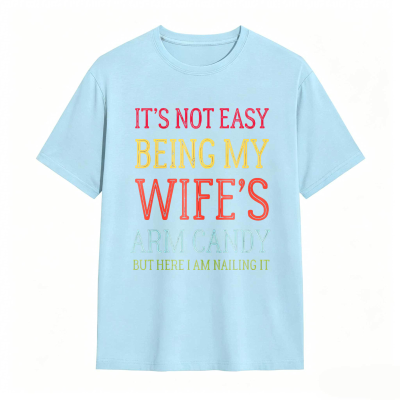 Dorawear™ Its Not Easy Being My Wifes Arm Candy But Here I Am Nailing It Unisex Classic T-shirt