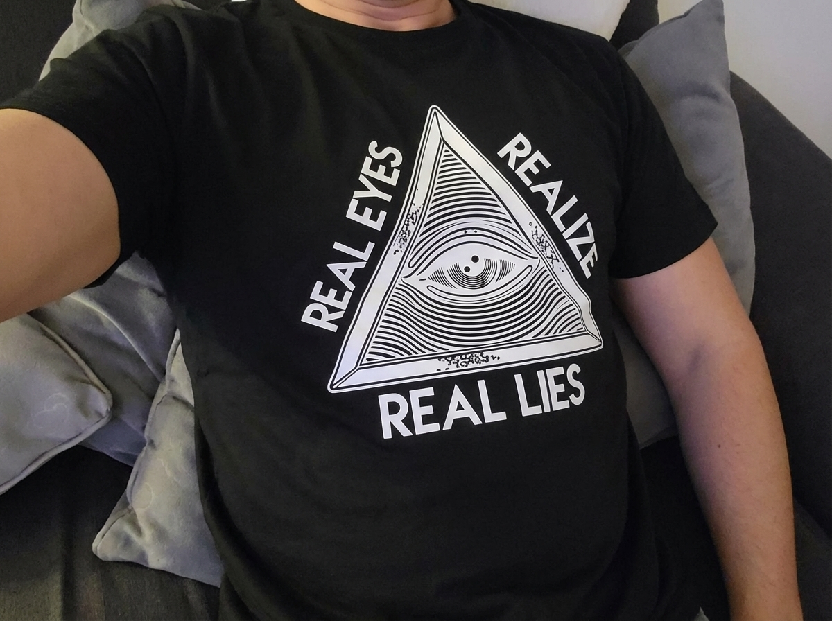 Dorawear™ Real Eyes Realize Real Lies Pyramid Eye T Shirt