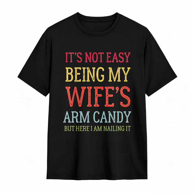 Dorawear™ Its Not Easy Being My Wifes Arm Candy But Here I Am Nailing It Unisex Classic T-shirt