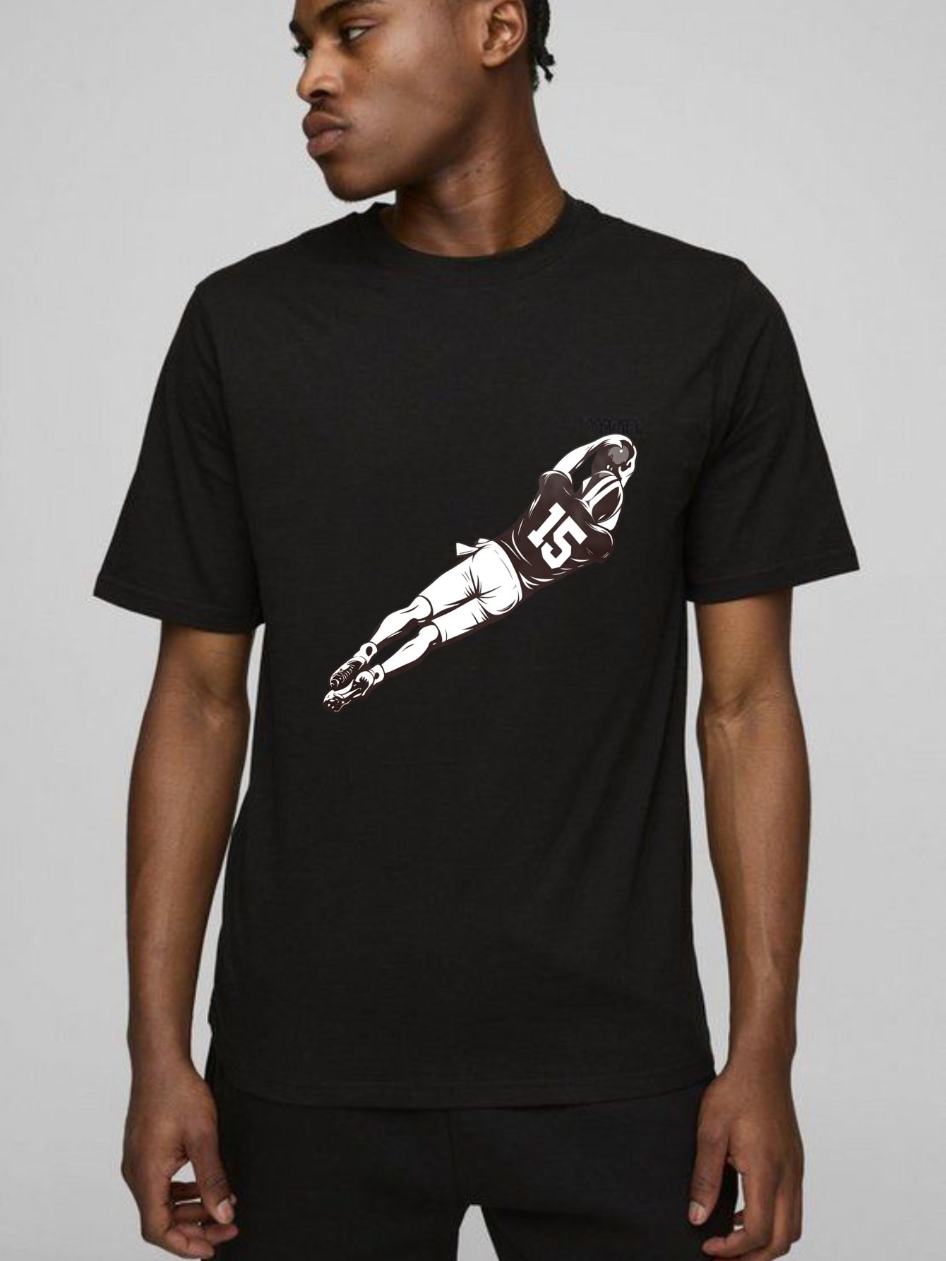 Dorawear™Football Player In Mid Air Catching Ball T Shirt
