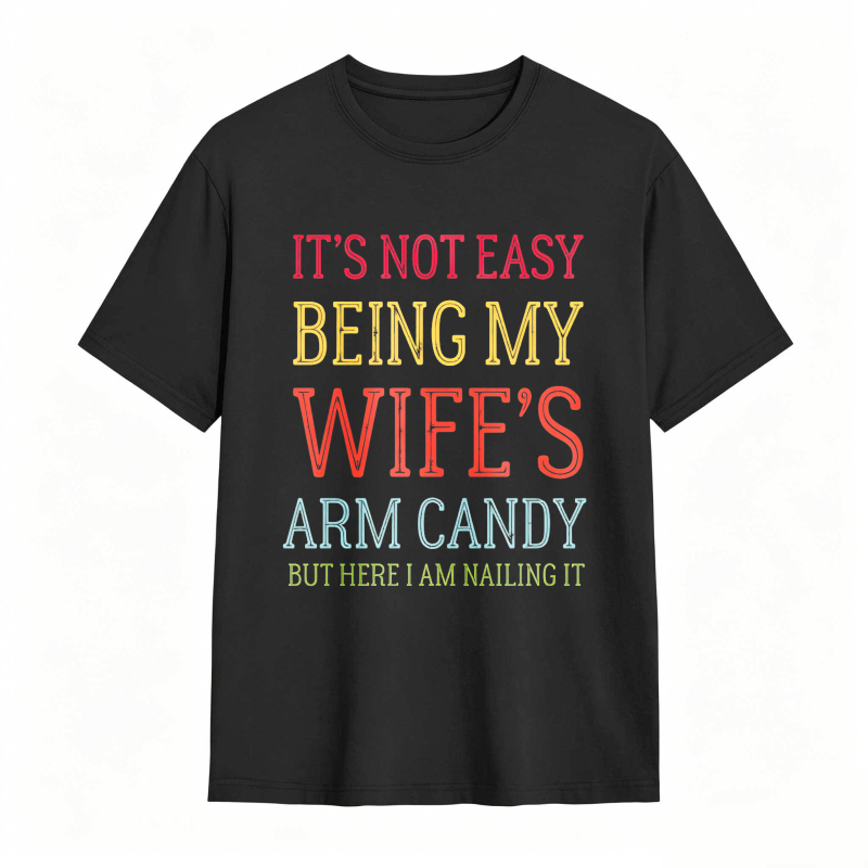 Dorawear™ Its Not Easy Being My Wifes Arm Candy But Here I Am Nailing It Unisex Classic T-shirt