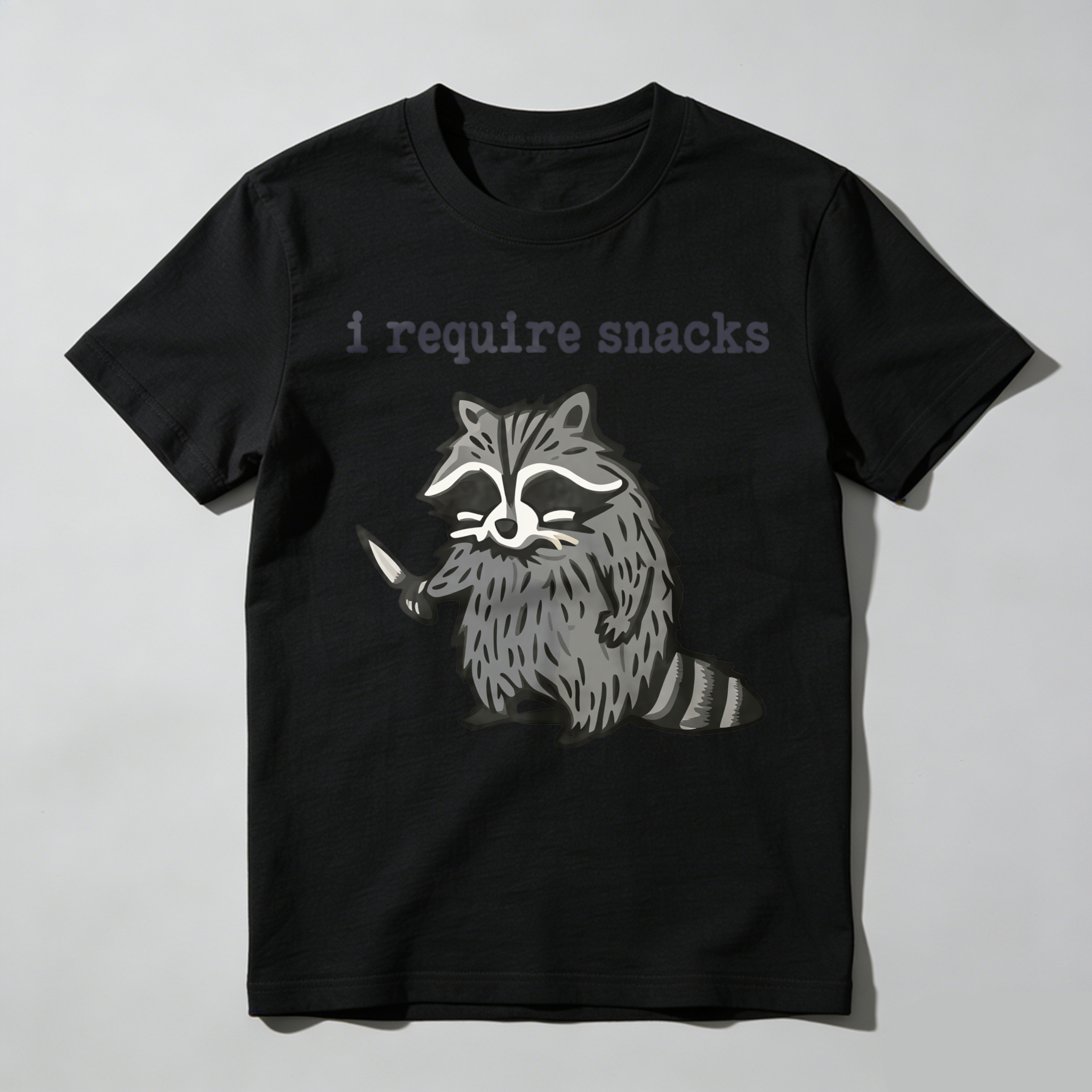 Dorawear™ Racoon Holding Knife With Text Above T Shirt