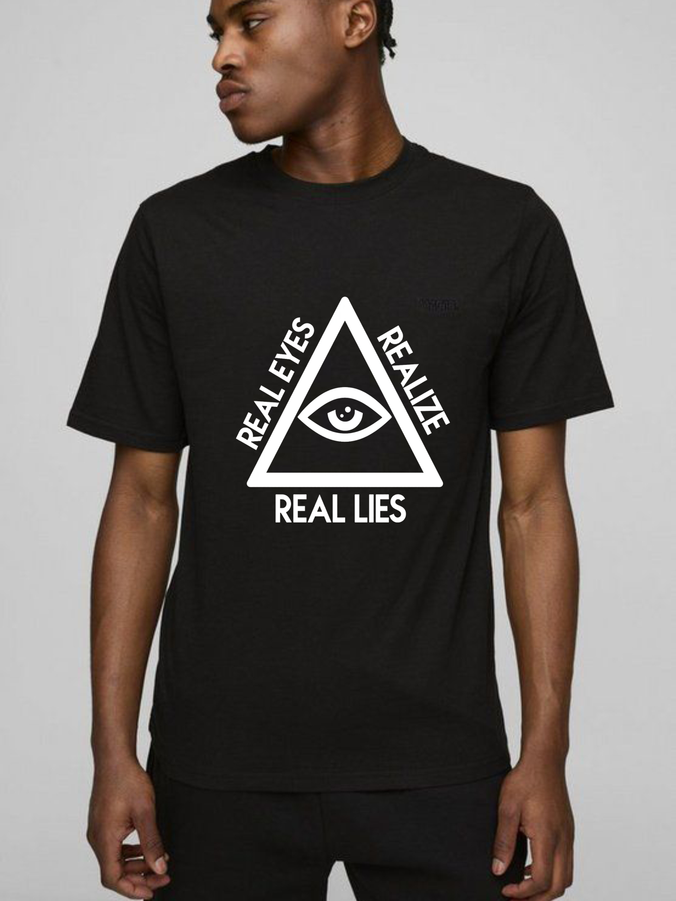 Dorawear™Real Eyes Realize Real Lies  T Shirt