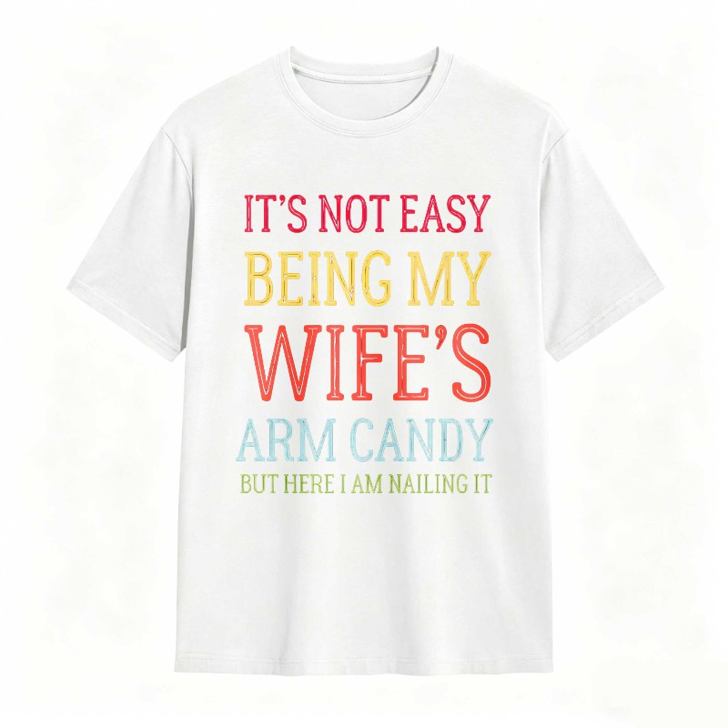 Dorawear™ Its Not Easy Being My Wifes Arm Candy But Here I Am Nailing It Unisex Classic T-shirt