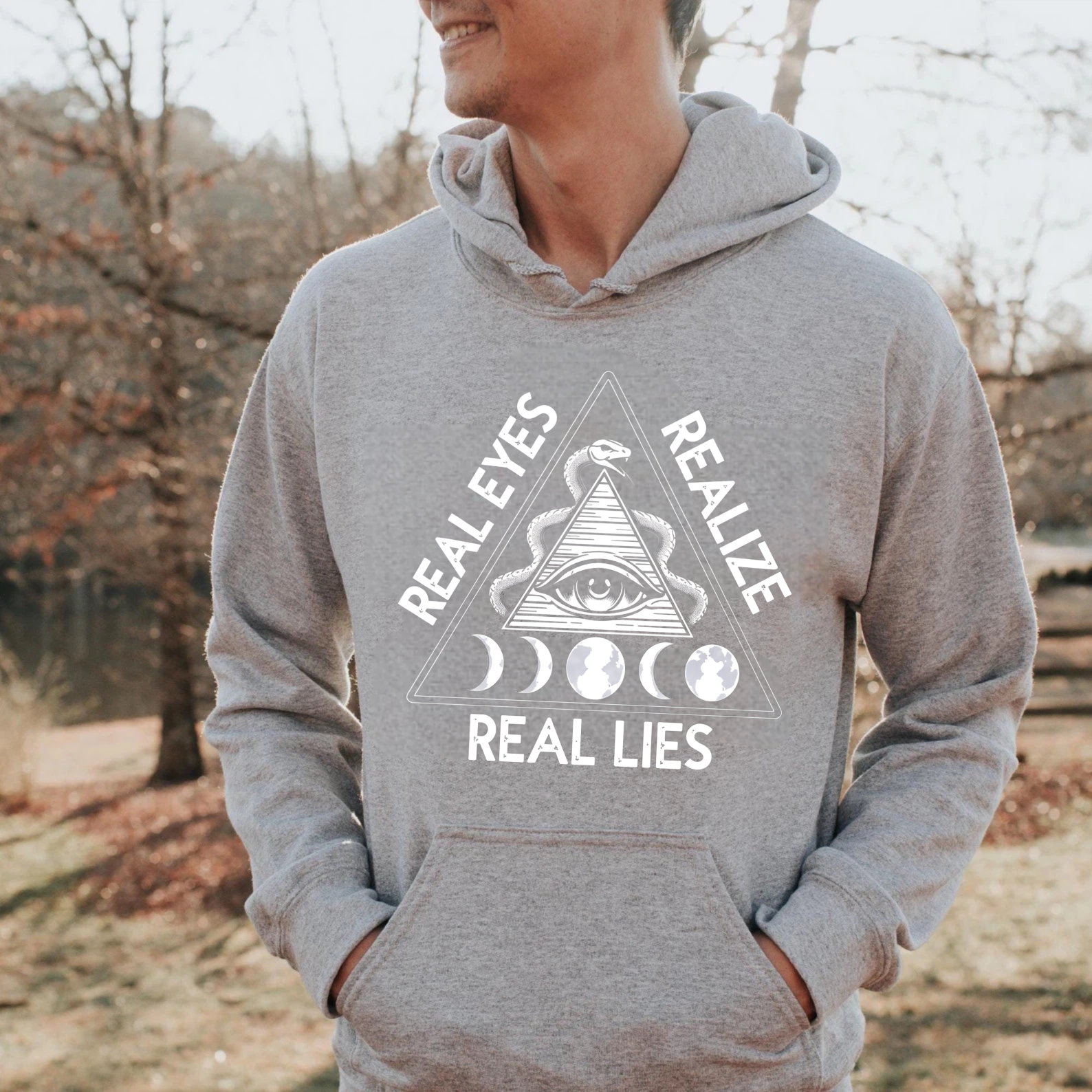 Dorawear™ Real Eyes Realize Real Lies Hoodie All Seeing Eye Symbol Moon Phases Design Black Sweatshirt Unisex Pullover Fashion Statement Apparel-Dorawear