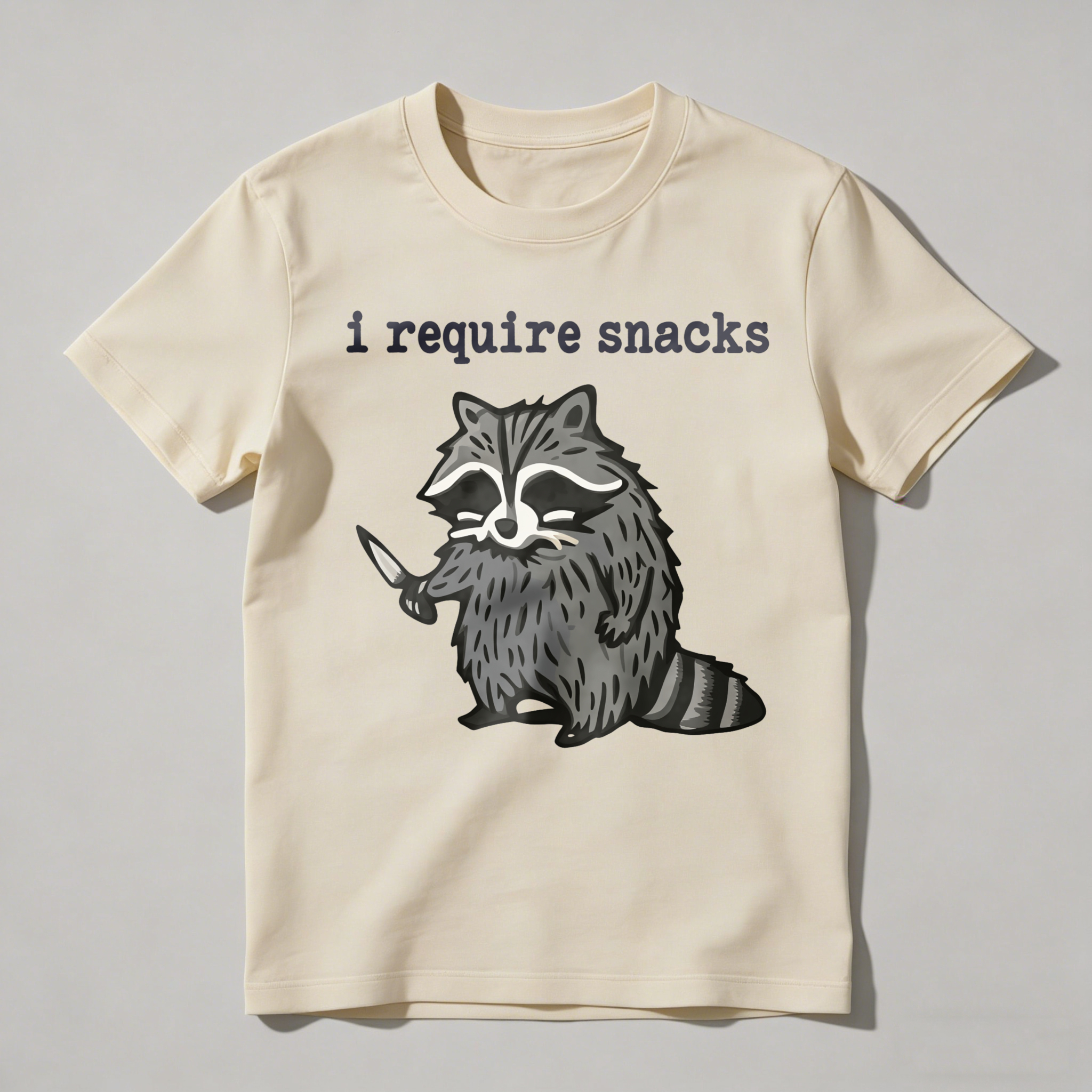 Dorawear™ Racoon Holding Knife With Text Above T Shirt