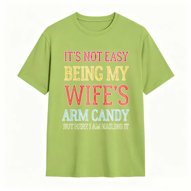 Dorawear™ Its Not Easy Being My Wifes Arm Candy But Here I Am Nailing It Unisex Classic T-shirt
