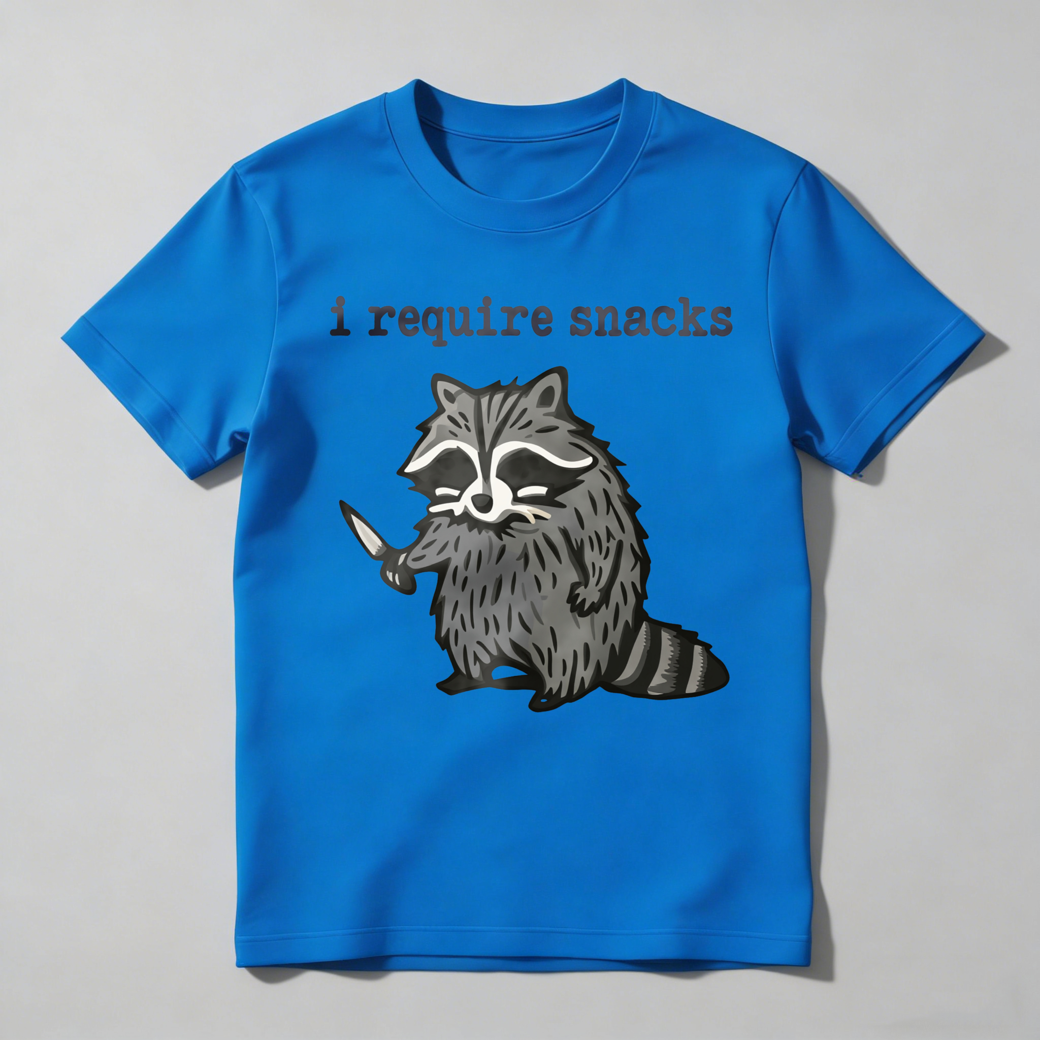 Dorawear™ Racoon Holding Knife With Text Above T Shirt
