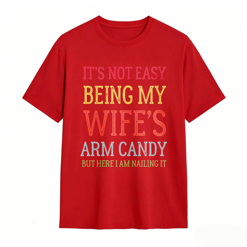 Dorawear™ Its Not Easy Being My Wifes Arm Candy But Here I Am Nailing It Unisex Classic T-shirt