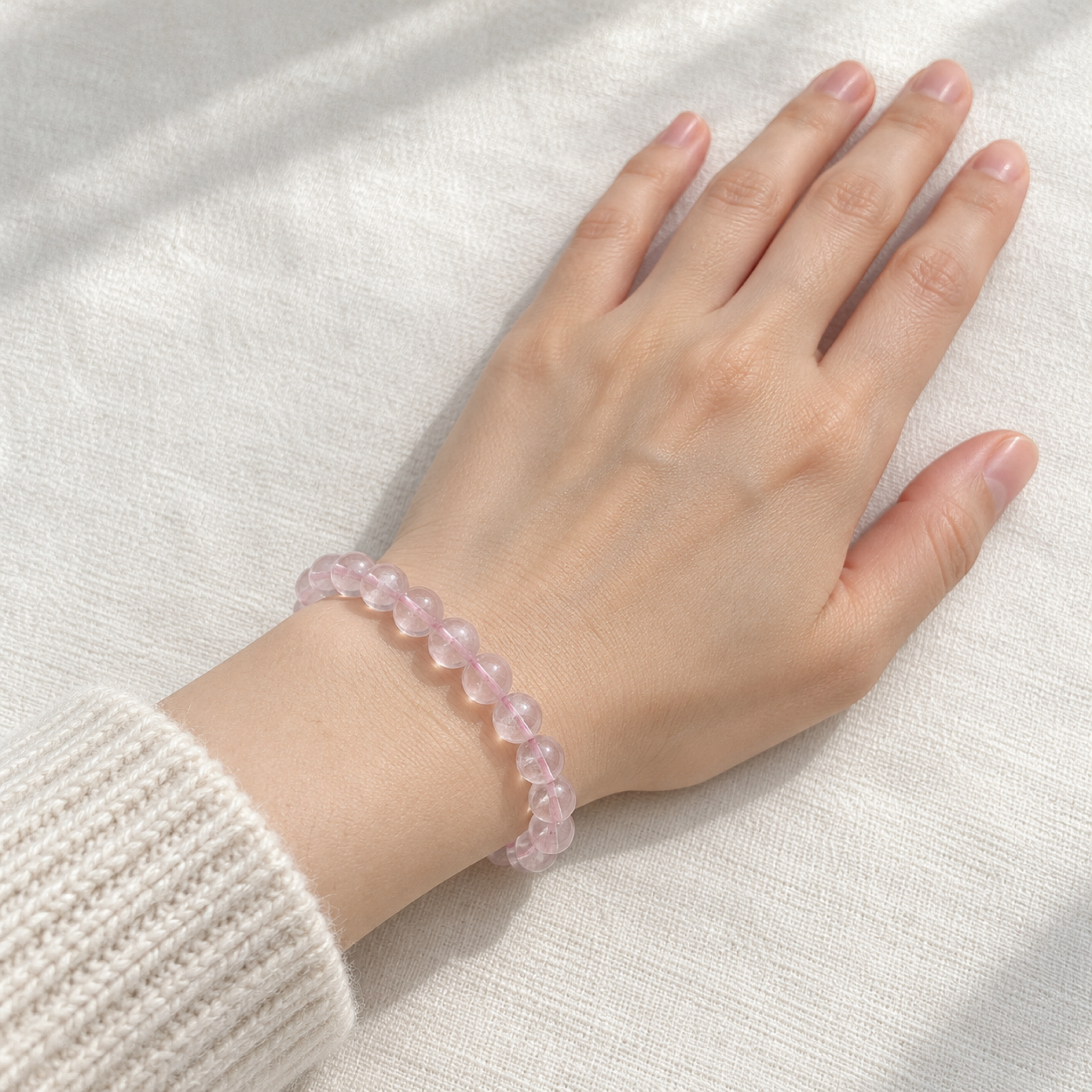 Grade A Madagascar Rose Quartz Bracelet — on the wrist