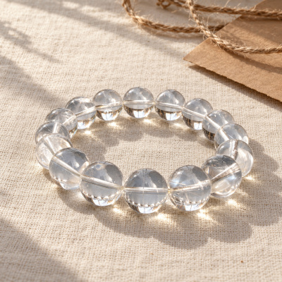 Clear quartz bracelet on linen in soft daylight
