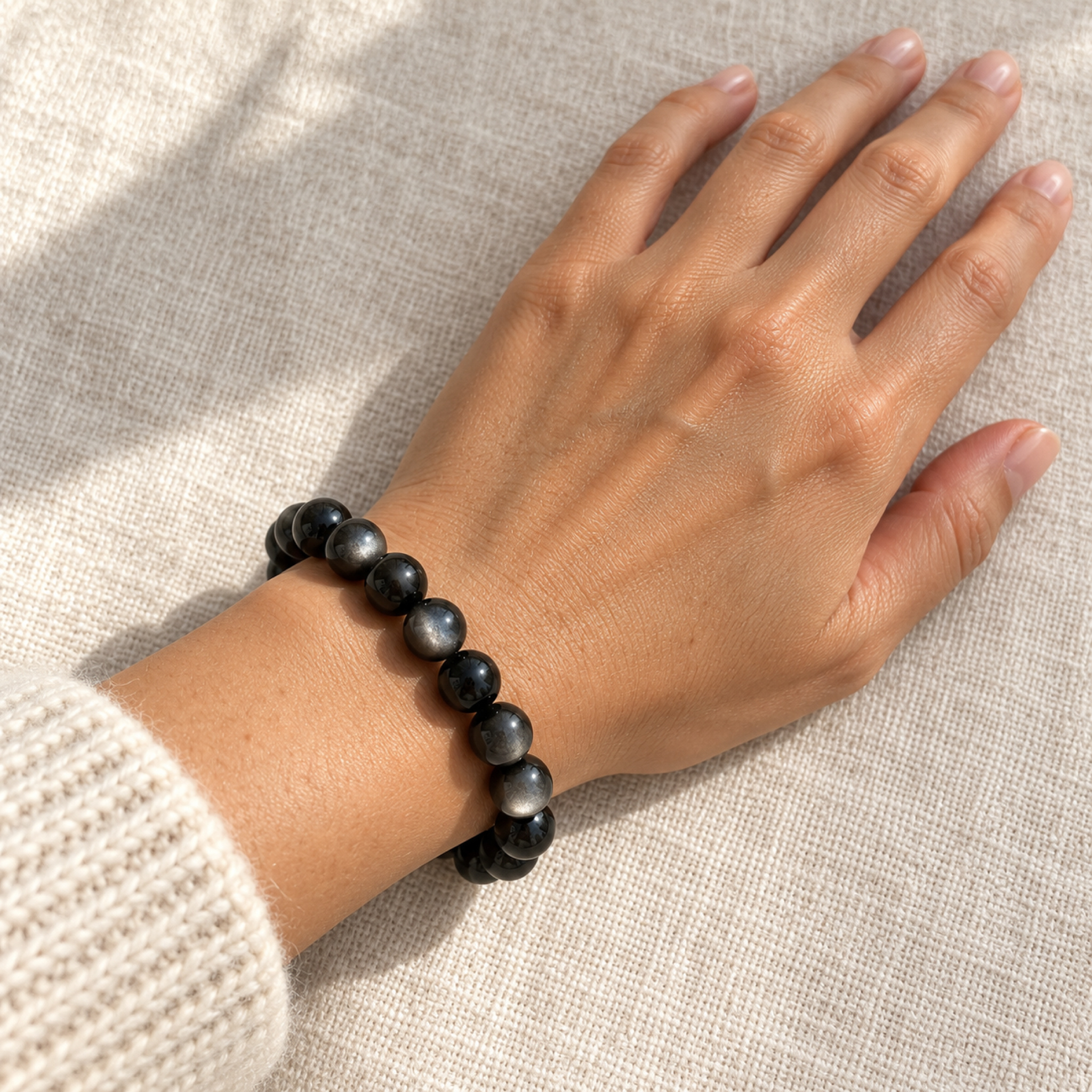Silver Sheen Obsidian Bracelet — on the wrist