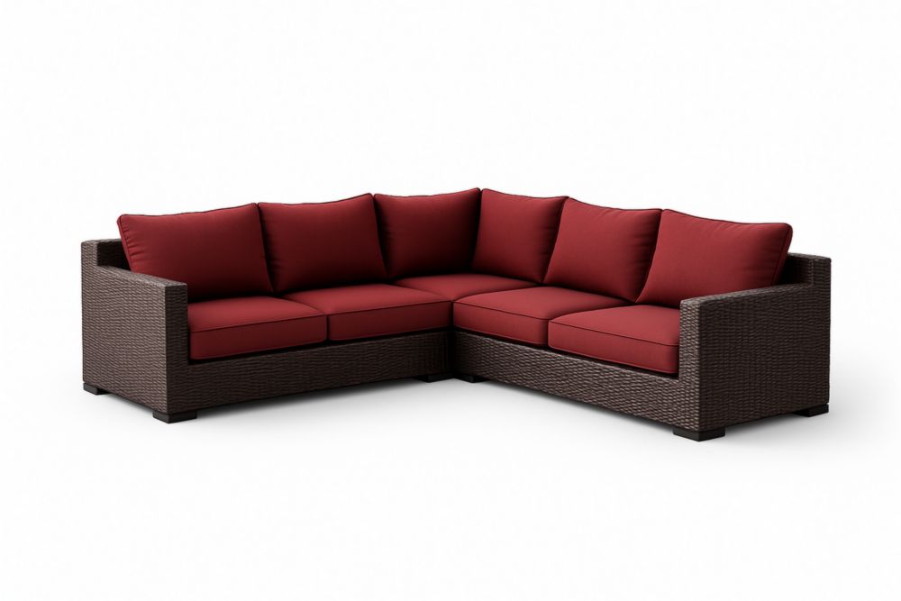 Divano angolare in rattan sintetico con cuscini rossi