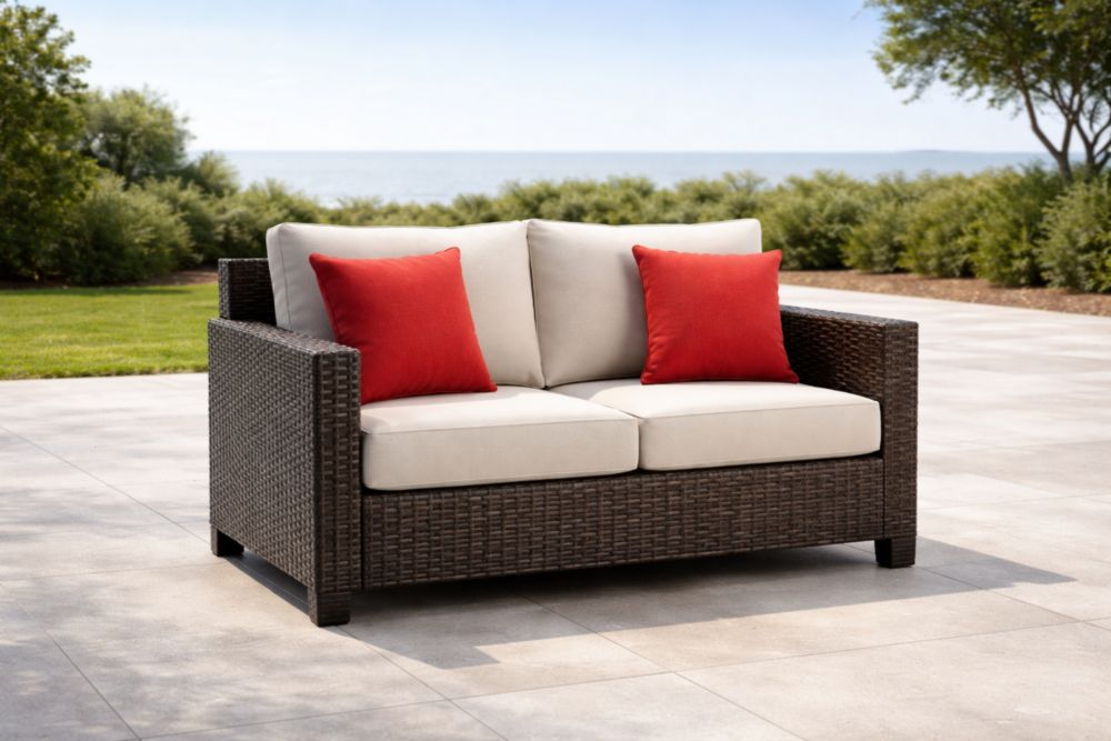 Divano a due posti in Rattan sintetico con cuscini in tessuto beige e rosso