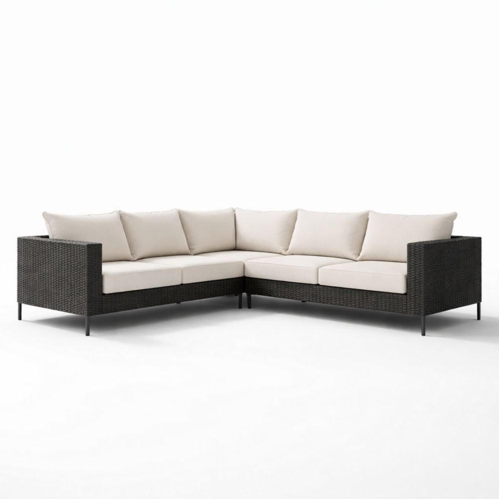 Canapé d'angle en rotin synthétique et coussins beiges