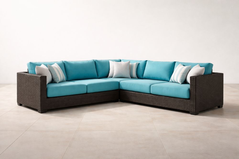 Canapé d'angle en résine tressée avec coussins turquoise