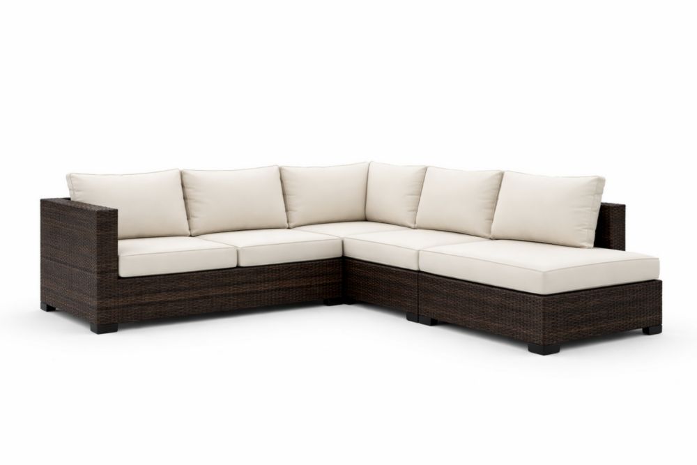 Canapé d'angle extérieur en rotin brun coussins amovibles tissu beige