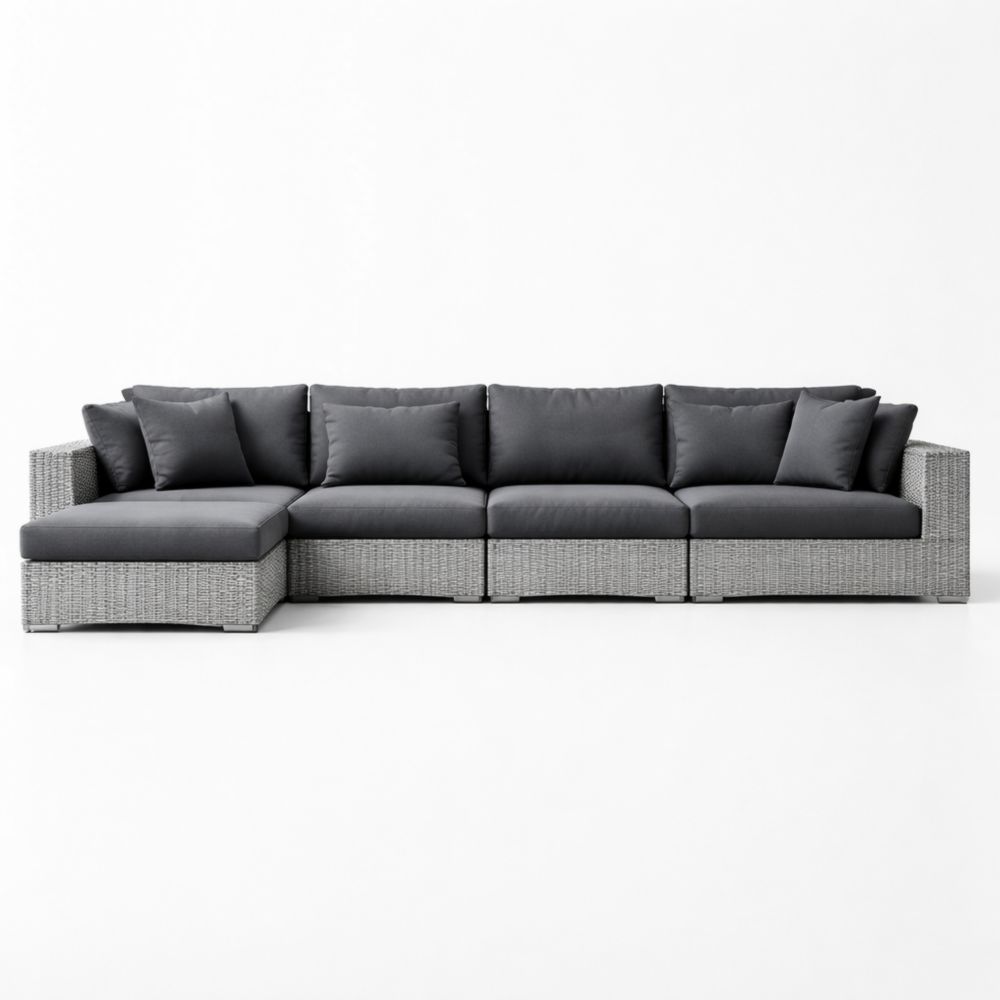 Canapé modulable en rotin gris avec coussins gris foncé, adapté à une utilisation en extérieur