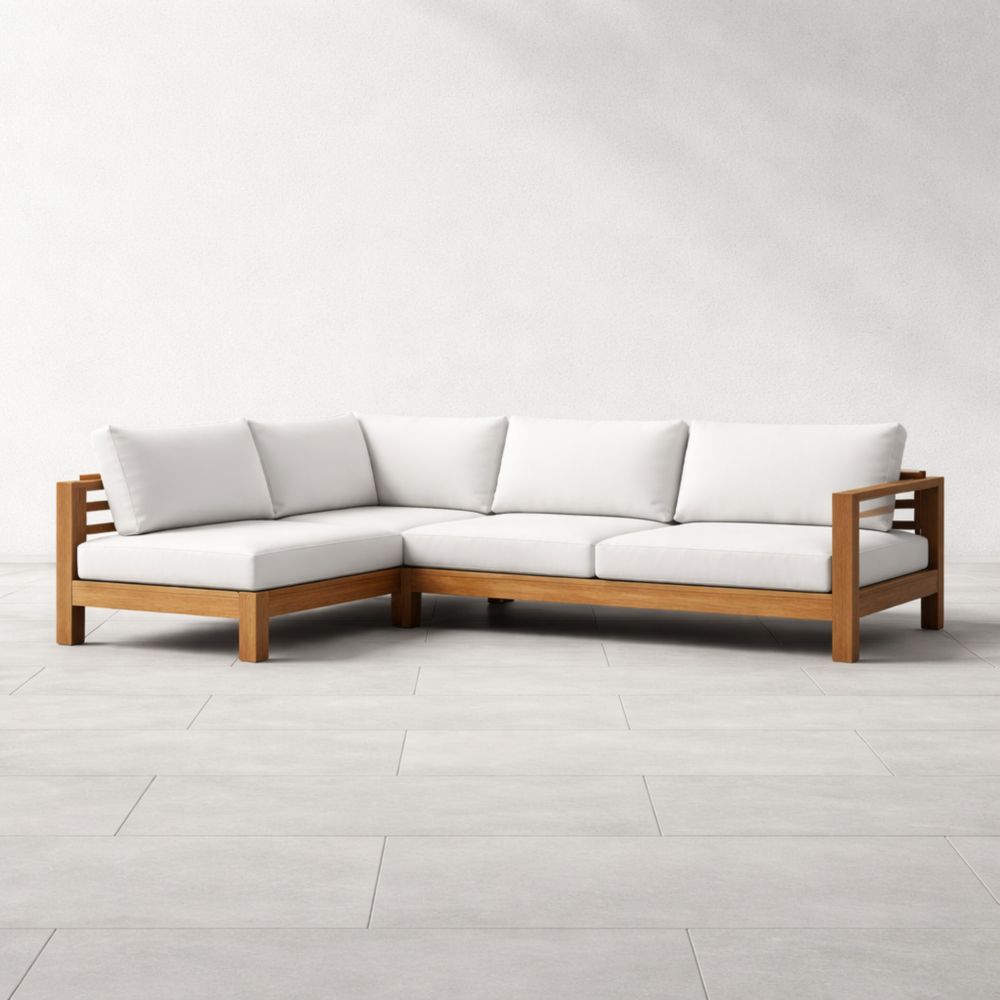 Canapé d'angle en bois avec coussins blancs