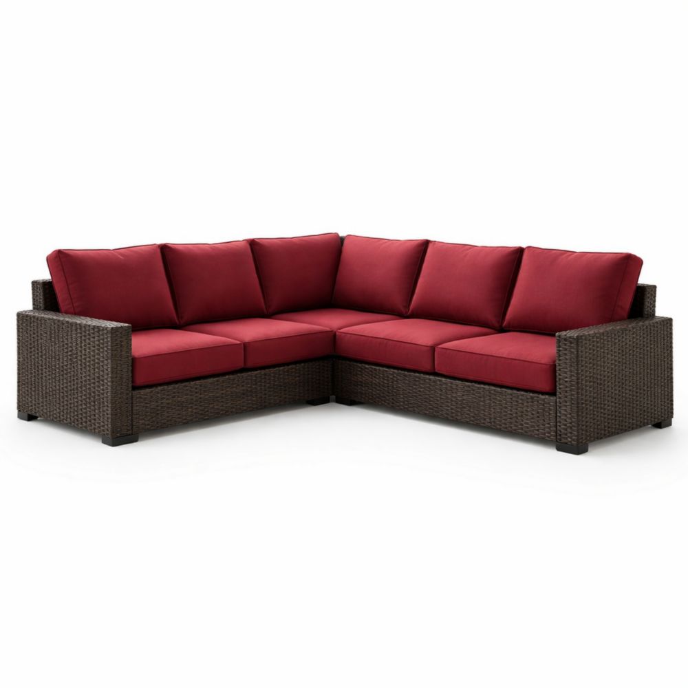 Canapé d'angle en résine tressée avec coussins rouges pour extérieur