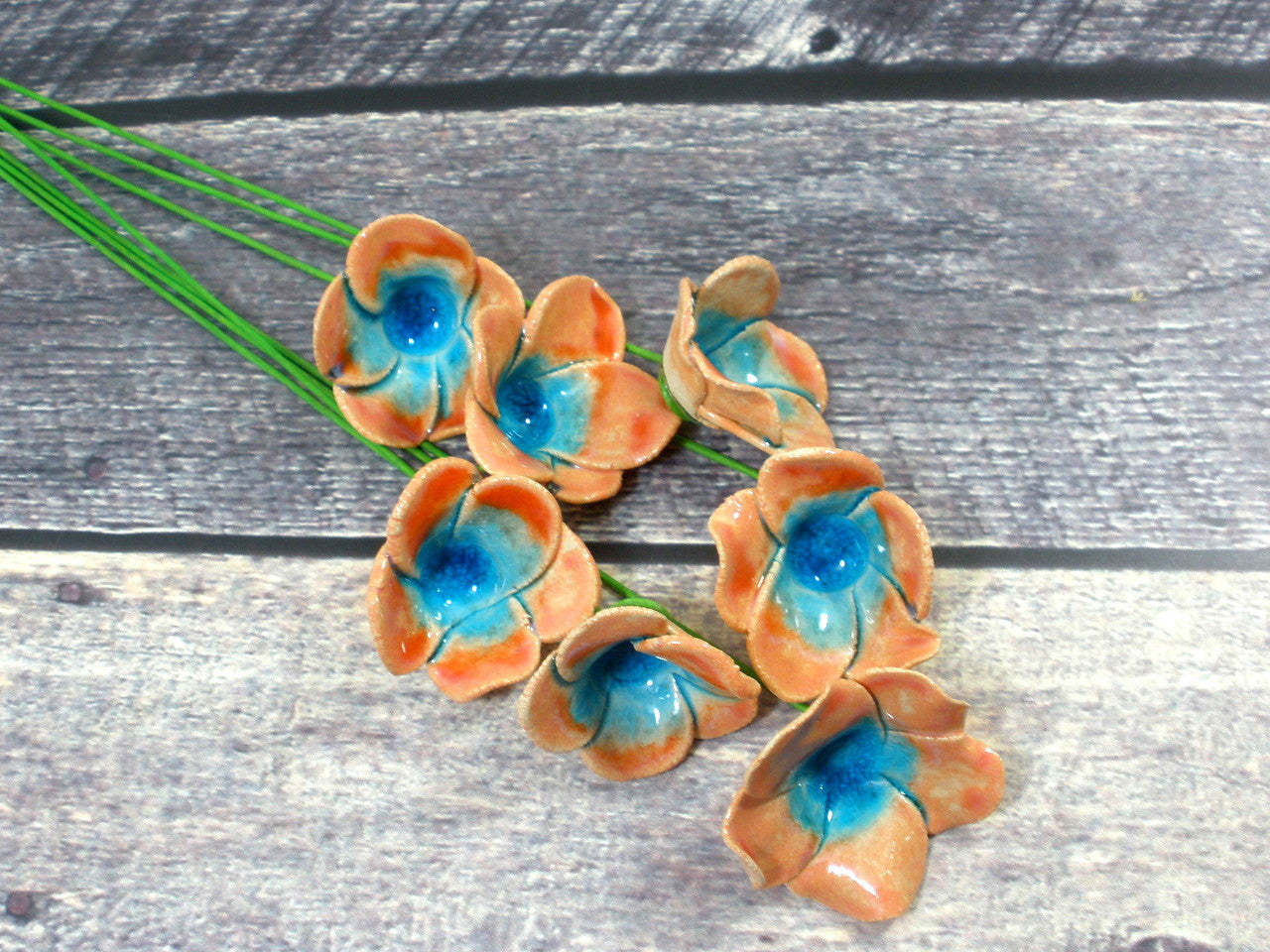Tangerine and turquoise ceramic flowers
