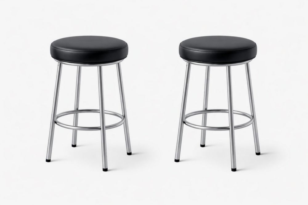 Tabouret rond en cuir synthétique noir avec pieds en acier chromé