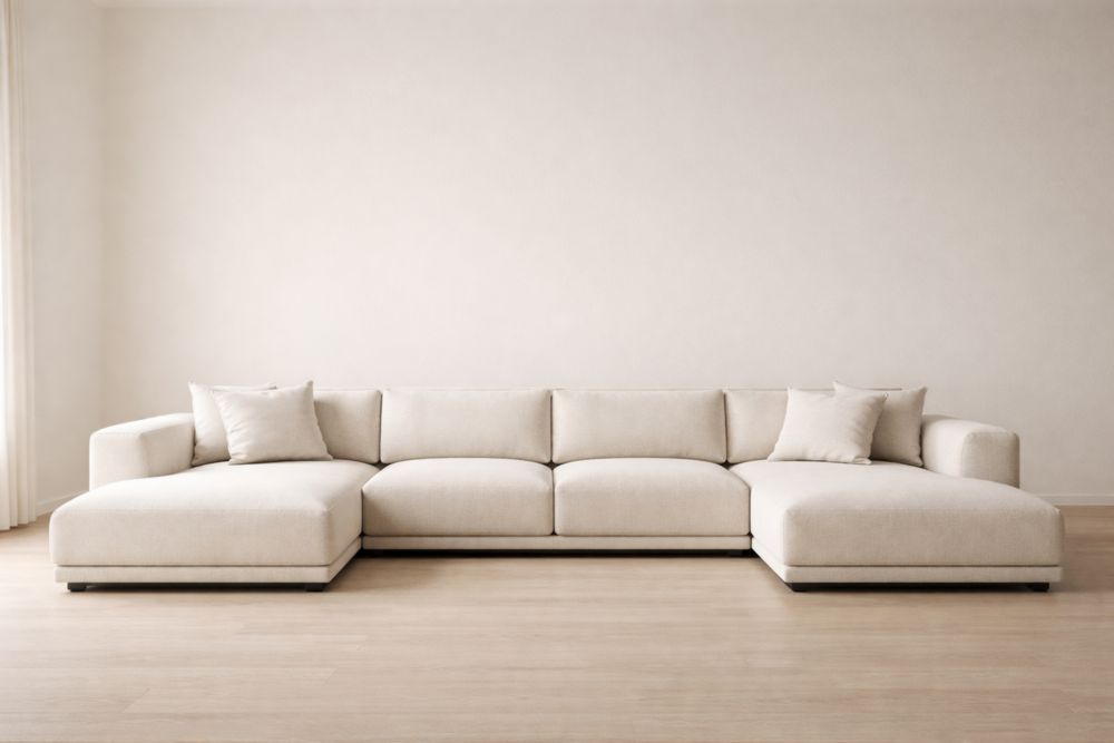 Divano componibile in tessuto beige con chaise longue e cuscini