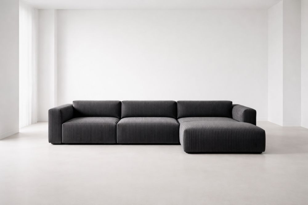 Divano modulare in tessuto a coste grigio con chaise longue