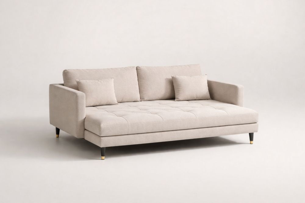 Divano letto in tessuto beige con cuscini