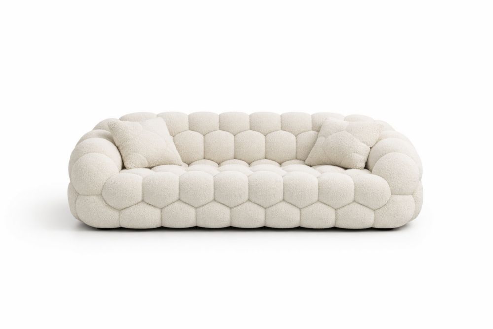 Divano bouclè imbottito bianco con cuscini