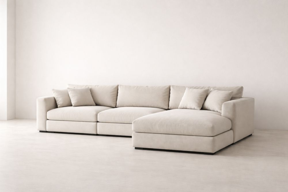 Divano angolare in tessuto beige con chaise longue